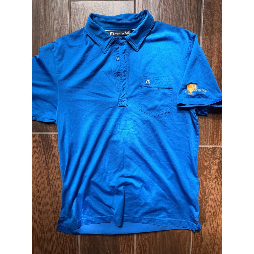 TravisMathew Mens Blue Presidents Cup Golf Polo Shirt Size M Short Sleeve Pocket